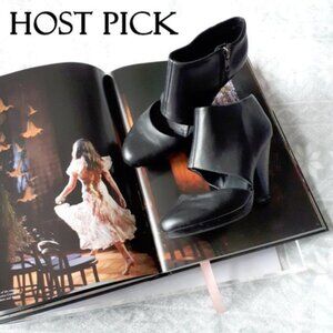 Aldo black faux leather bootie with cut out detail